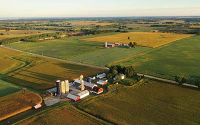 Early-morning aerial view of farmland in early fall